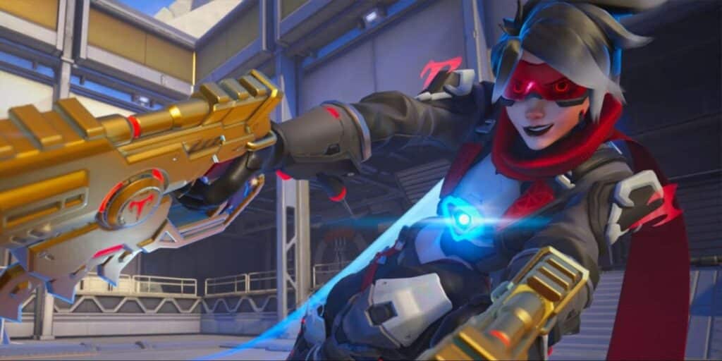 Lena from a Overwatch 2 holds a golden, high-tech gun, with glowing accents and a sleek, dark outfit in an industrial setting.