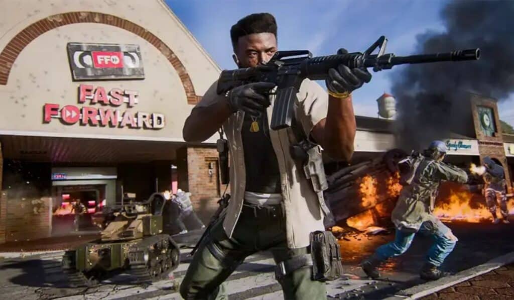 A soldier engages enemies near a burning car during a Call of Duty mission